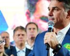 Após Lula confirmar presença, Flávio Bolsonaro anuncia que irá a debate da TV Band